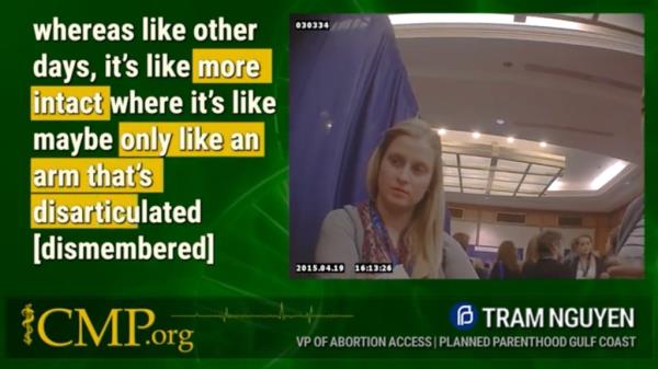 Woman looking off camera in video clip