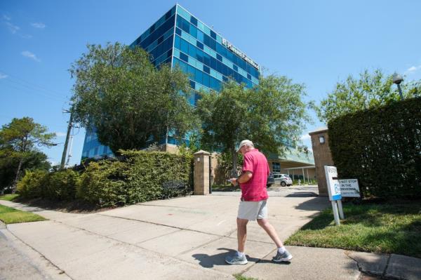 A man praying outside Planned Parenthood in Houston, June 24, 2022, following the Supreme Court decision on abortion