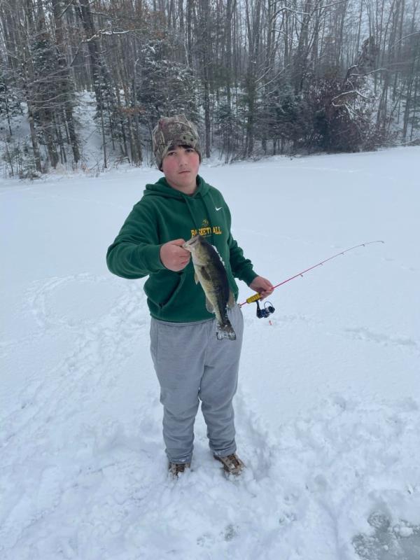 Mikey pictured fishing in the snow.