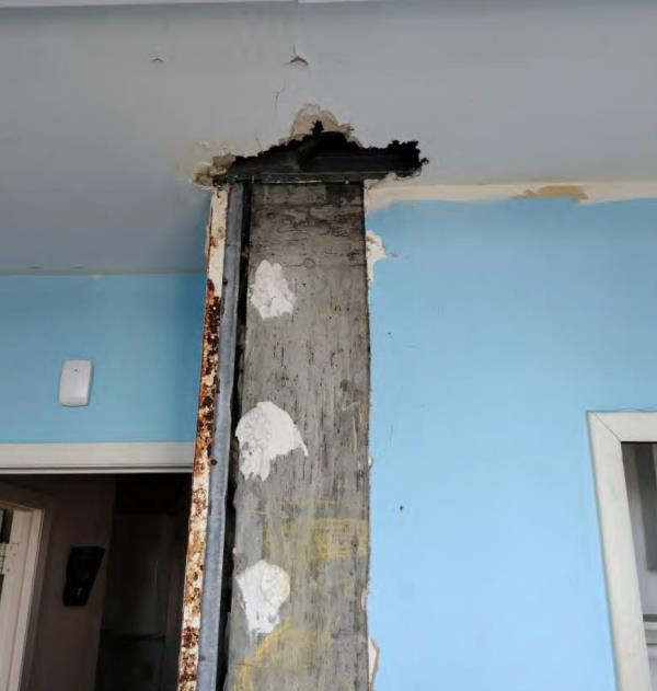 Extensive water damage inside the apartment.