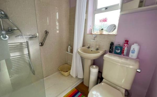 Story from Jam Press (Toilet Curtain) Pictured: The property in Barrow, near Bury St Edmunds, that features a toilet behind a shower curtain in the Master bedroom. Pictured is the bathroom. Three-bed house for sale for 325,000 with TOILET hidden behind CURTAIN in bedroom A three-bed house for sale has been mocked because it has a TOILET hidden behind CURTAIN in the master bedroom. The semi-detached property is on the market for 325,000. It is well presented from the outside with a well-kept front garden and manicured lawn in the backyard and a garage. There are also solar panels on the roof. There is a spacious lounge diner and fully equipped kitchen and the o<em></em>nly bathroom - with a walk-in shower, toilet and basin - is downstairs. The master bedroom and two smaller o<em></em>nes are upstairs. But eagle-eyed home hunters were quick to spot the bizarre hidden loo. In between a chest of drawers - with picture f<em></em>rames on top - and a wardrobe there is a white toilet. There is no door to shut it off from the rest of the room and o<em></em>nly a shower-style curtain to offer privacy. The house in the village of Barrow, near Bury St Edmunds, Suffolk is being sold by Day and Knight Property and advertised on Rightmove. Local Josh Pearson said: ?I?ve seen some shockers on Rightmove in my time. ?But this is right up there with the worst of ?em.? Another - called Ben - joked it would be good if you needed the loo while playing computer games in bed. He said: ?Every gamers dream.? Estate agents make no mention of the unusual toilet. But they do say there is an ?opportunity to add an ensuite? in the main bedroom. The property listing reads: ?Located in the desirable village of Barrow and offering extensive external space, this property is ideal if you are looking for a home for a growing family. ?Stepping into the spacious hallway, you have access to the whole of the ground floor, with the lounge/diner situated to the left. ?Flooded with natural light