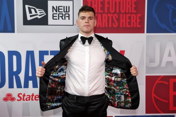 Do<em></em>novan Clingan arriving in a tuxedo at the Barclays Center for the first round of the 2024 NBA Draft