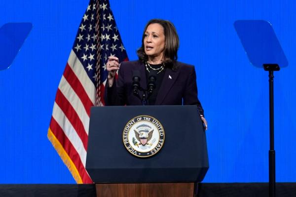 Vice President Kamala Harris speaking at the podium during the American Federation of Teachers' 88th natio<em></em>nal co<em></em>nvention in 2024