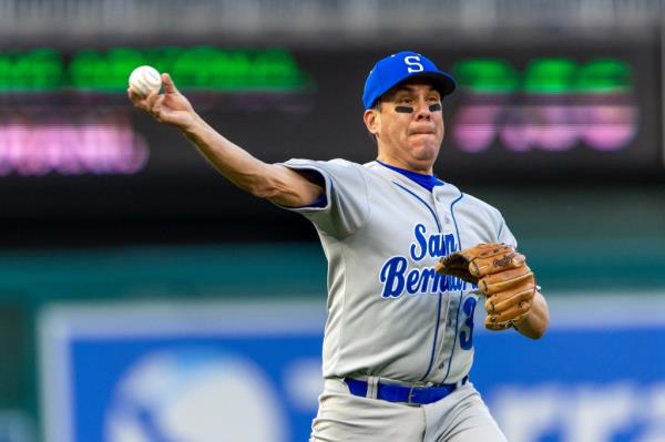 Rep. Pete Aguilar (D-CA) fields a ball against the Republicans during the Co<em></em>ngressional ba<em></em>seball Game.
