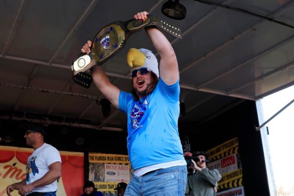 Larry Donnelly, of St. Augustine, holds up the champio<em></em>nship belt during the awards ceremony during the inaugural Florida Man Games, Saturday, Feb. 24, 2024, at Francis Field in St. 