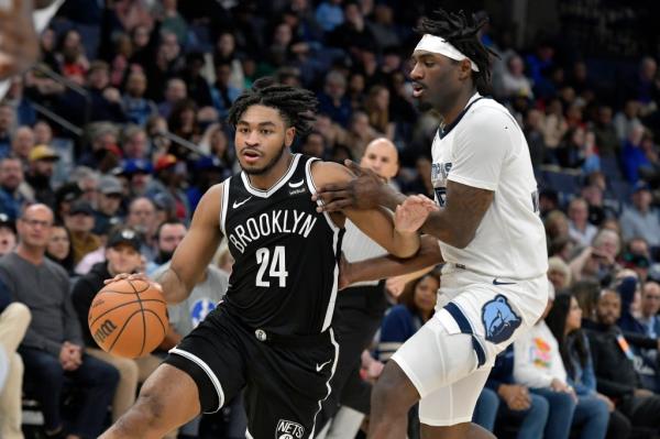 Cam Thomas left during the fourth quarter of the Grizzlies' game with a right ankle injury.