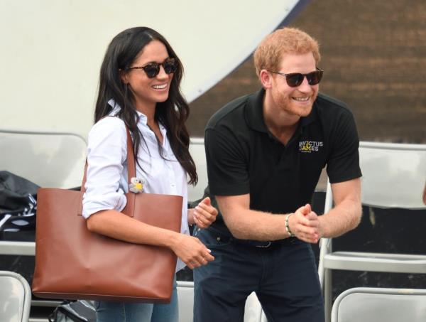 Meghan Markle and Prince Harry attending the Wheelchair Tennis event at the Invictus Games Toro<em></em>nto 2017