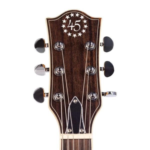 The headstock of the guitar features the number 