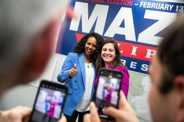 Mazi Pilip and Representative Elise Stefanik speaking at a rally with supporters at Republican Headquarters in Franklin Square, NY.
