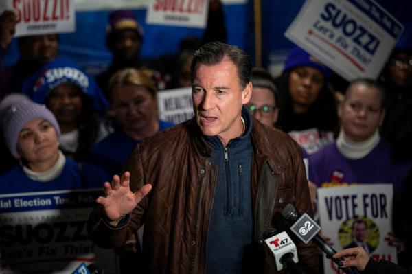 Tom Suozzi speaking into micropho<em></em>nes while campaigning in Westbury, New York for co<em></em>ngressional seat in New York's 3rd co<em></em>ngressional district.