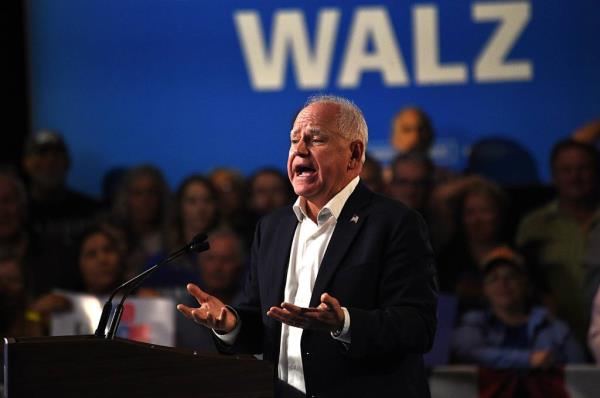 Governor and candidate for Vice President Tim Walz speaks during a rally at the Grand Sierra Resort in Reno on Oct. 8, 2024.