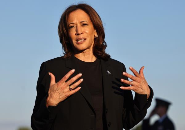 Democratic presidential nominee, Vice President Kamala Harris speaks to the media before boarding Air Force Two after assessing the Hurricane Helene recovery respo<em></em>nse in North Carolina on October 5, 2024 in Charlotte, North Carolina.