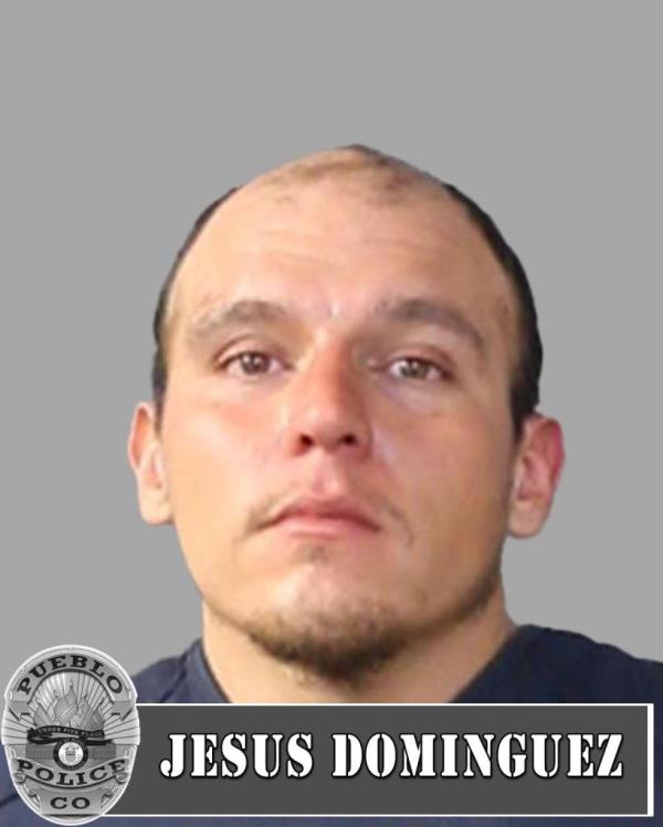 Jesus Dominguez is pictured in a mugshot.