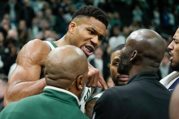 ' Giannis Antetokounmpo argues with a Indiana Pacers coach after an NBA game on Wednesday.