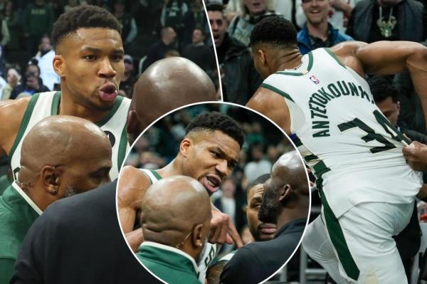 Bucks' Giannis Antetokounmpo runs toward the Indiana Pacers locker room after their game on Wednesday.