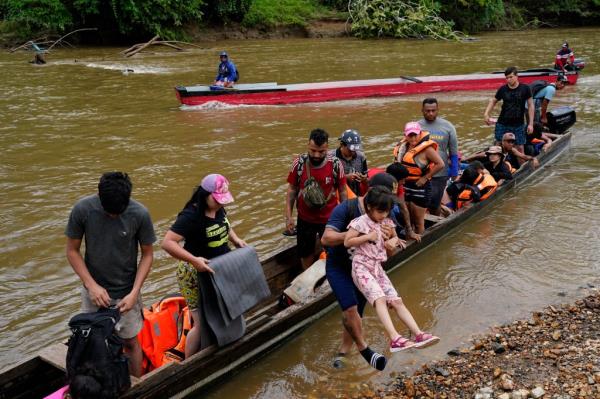 A group of migrants sailing from Colombia to Panama.