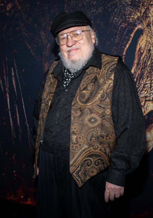 George RR Martin smiling. 