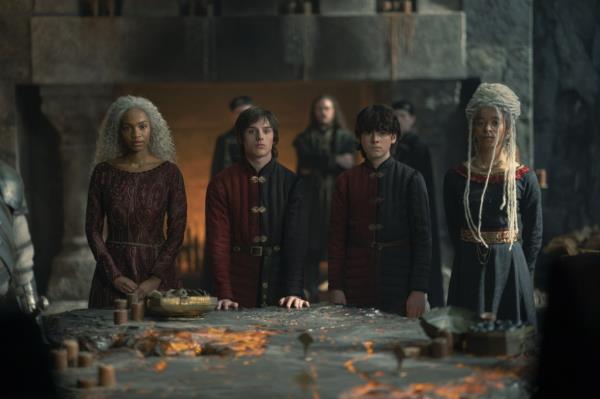 A group of kids looking solemn. 