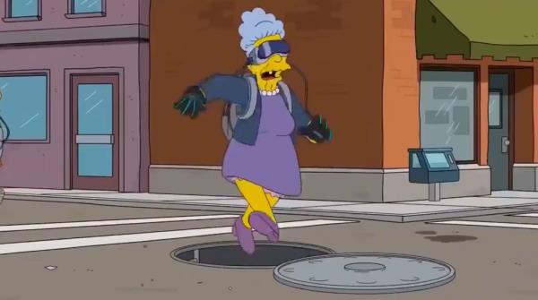 A lady falling in a pothole in the 