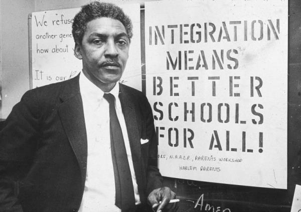 2nd February 1964: American civil rights activist Bayard Rustin (1912 - 1987), spokesman for the Citywide Committee for Integration, at the organization's headquarters at Silcam Presbyterian Church, Brooklyn, New York City. (Photo by Patrick A. Burns/New York Times Cohttp://www.huioj.com/news/show/116286/Getty Images)