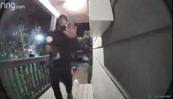 Footage from a Ring doorbell camera shows Burham on a woman's porch before 'allegedly torching her car in the driveway.'