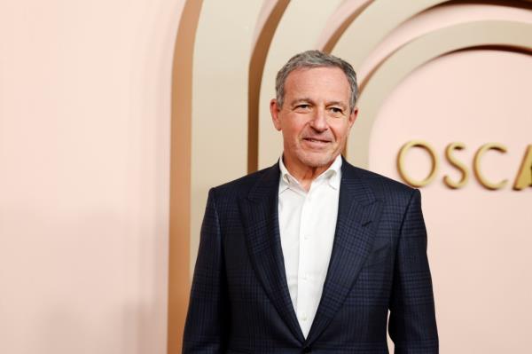 Bob Iger in a suit arriving at the 2024 Oscars Nominees Luncheon Red Carpet at The Beverly Hilton Hotel in Beverly Hills, CA