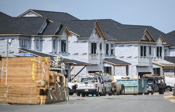 Houses under co<em></em>nstruction are seen in a new development in Brambleton, Virginia on August 14, 2024.