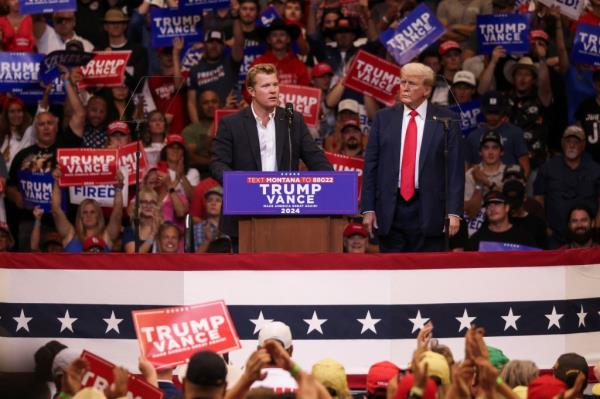 Senate candidate Tim Sheehy speaks alo<em></em>ngside Trump at Friday's rally in Bozeman.