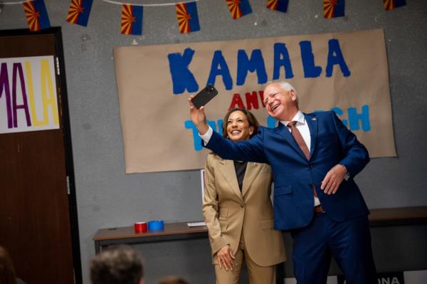 Vice President Kamala Harris and her running mate Minnesota Gov. Tim Walz take a selfie in Glendale, Arizona on Aug. 9, 2024.