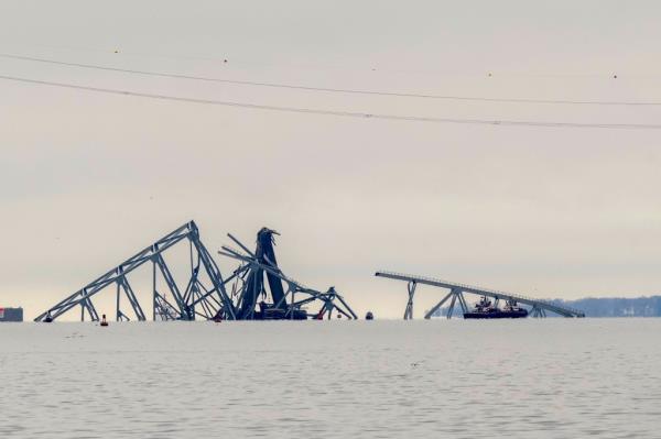Wreckage of the Francis Scott Key Bridge in Baltimore, collapsed after a cargo ship collision, with me<em></em>tal structures scattered in the water