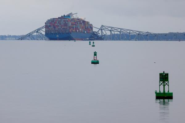 View of the collapsed Francis Scott Key Bridge from Fort McHenry in Baltimore, Maryland on March 27, 2024