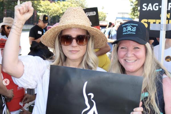 Veteran stuntwoman Heidi Pascoe with friend on picket line