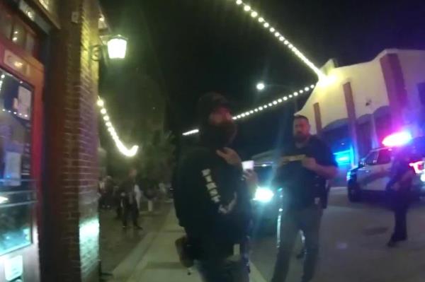 Ribar being arrested.