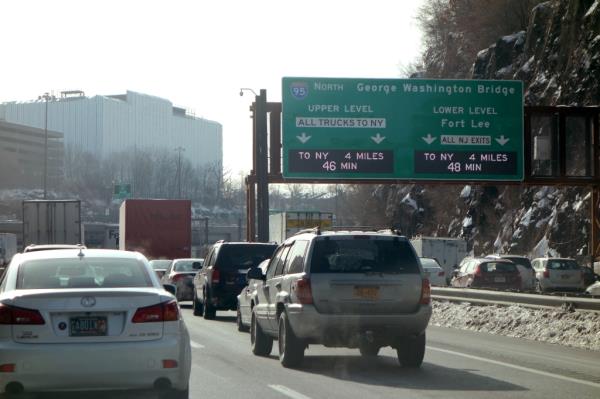 A typical morning commute backup at the George Washington Bridge. Cars and Trucks wait to crossover into New York City.