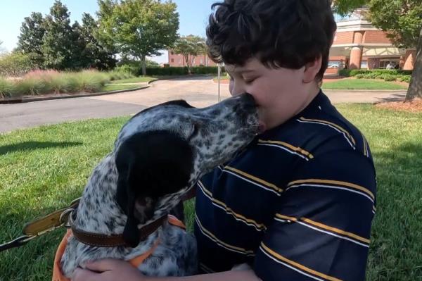 North Carolina boy Jamie Parker, 11, credits his dog Tucker for saving his life when he became trapped inside his house during Hurricane Helene.