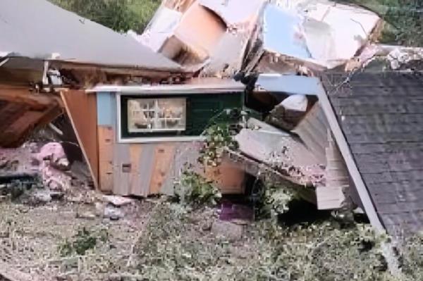 Parker was trapped under rubble after a mudslide hit the house.
