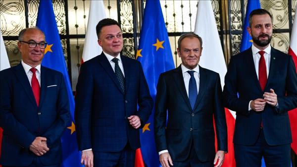 3 Polish opposition parties led by former Premier Tusk agree to form coalition government