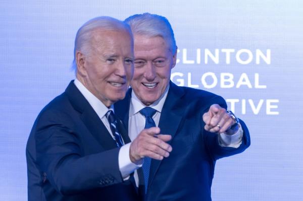 President Biden and Bill Clinton on stage 