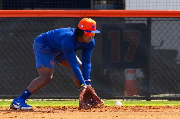 Luisangel Acuna fields grounders at Mets spring training on Feb. 16, 2024. 