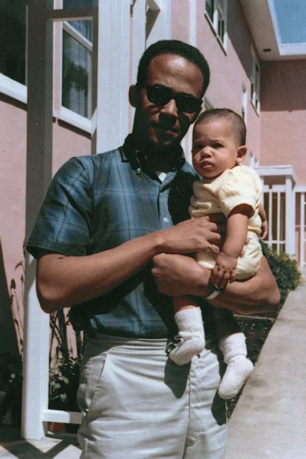 Do<em></em>nald Harris holding Kamala Harris in 1965.