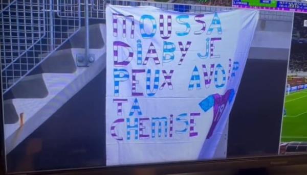 Young Aston Villa fan is left in tears as stadium steward co<em></em>nfiscates and bins his 'banned' handmade banner asking for his hero Moussa Diaby's shirt