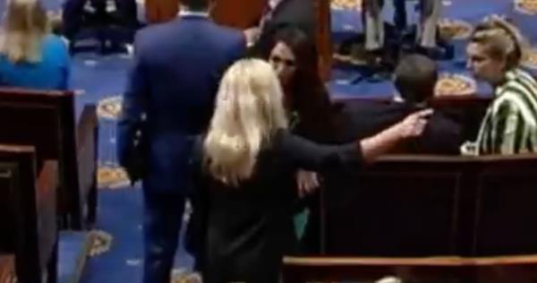 Marjorie Taylor Greene and Lauren Boebert seen getting into a spat on the House floor. 