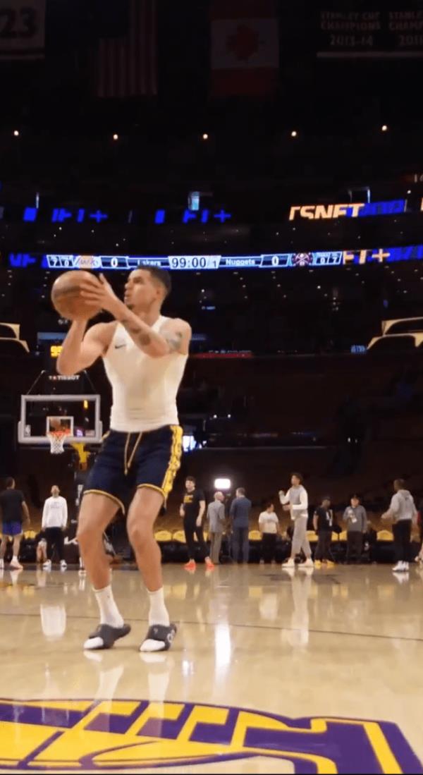Michael Porter Jr. warming up in slides ahead of Nuggets-Lakers Game 4 on Saturday.
