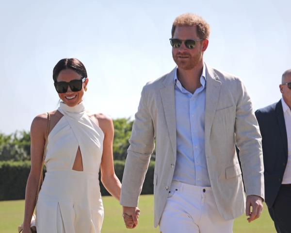 Left to right: Sentebale/Royal Salute players Dana Barnes, Duke of Sussex Prince Harry and his wife Meghan Markle, Adolfo Cambiaso and Malcolm Borwick hold the champion's trophy at Grand Champions Polo in Wellington, Fla., on April 12, 2024.