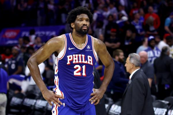 Joel Embiid, a basketball player for the Philadelphia 76ers, reacting with hands on hips after his team's loss to the New York Knicks in game six of the Eastern Co<em></em>nference First Round Playoffs