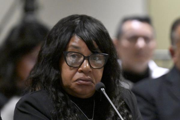 Madeline Brame seated at a co<em></em>ngressional hearing