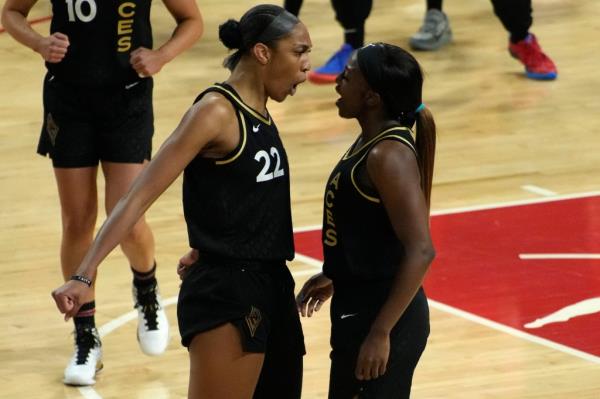Aces star A'Ja Wilson (left), who scored a game-high 26 points, celebrates with Jackie Yound during the Liberty's 104-76 blowout loss in Game 2 of the WNBA Finals.