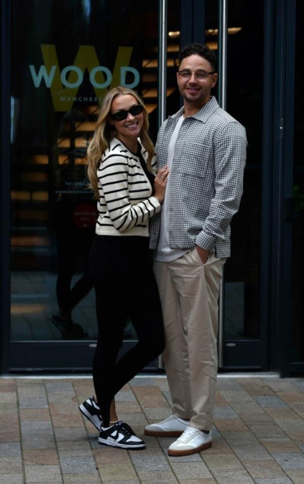 Adam Thomas and Caroline Thomas arrive at Wood Restaunt in Manchester City Centre 
