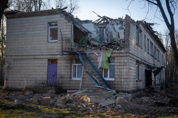 A damaged kindergarten following a Russian drone attack in Kyiv, Ukraine, Saturday, Nov. 25, 2023. Russia launched its most intense drone attack on Ukraine since the beginning of its full-scale invasion on Saturday morning, military officials said. (AP Photo/Efrem Lukatsky)
