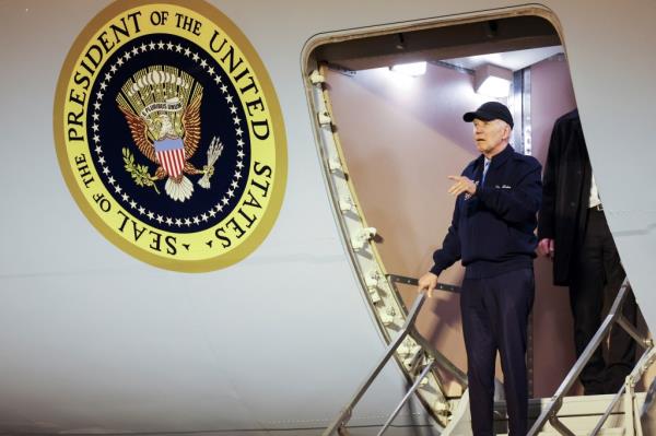Biden gestures as he deboards Air Force One, at Dover Air Force ba<em></em>se in Dover, Delaware, U.S., July 17, 2024.